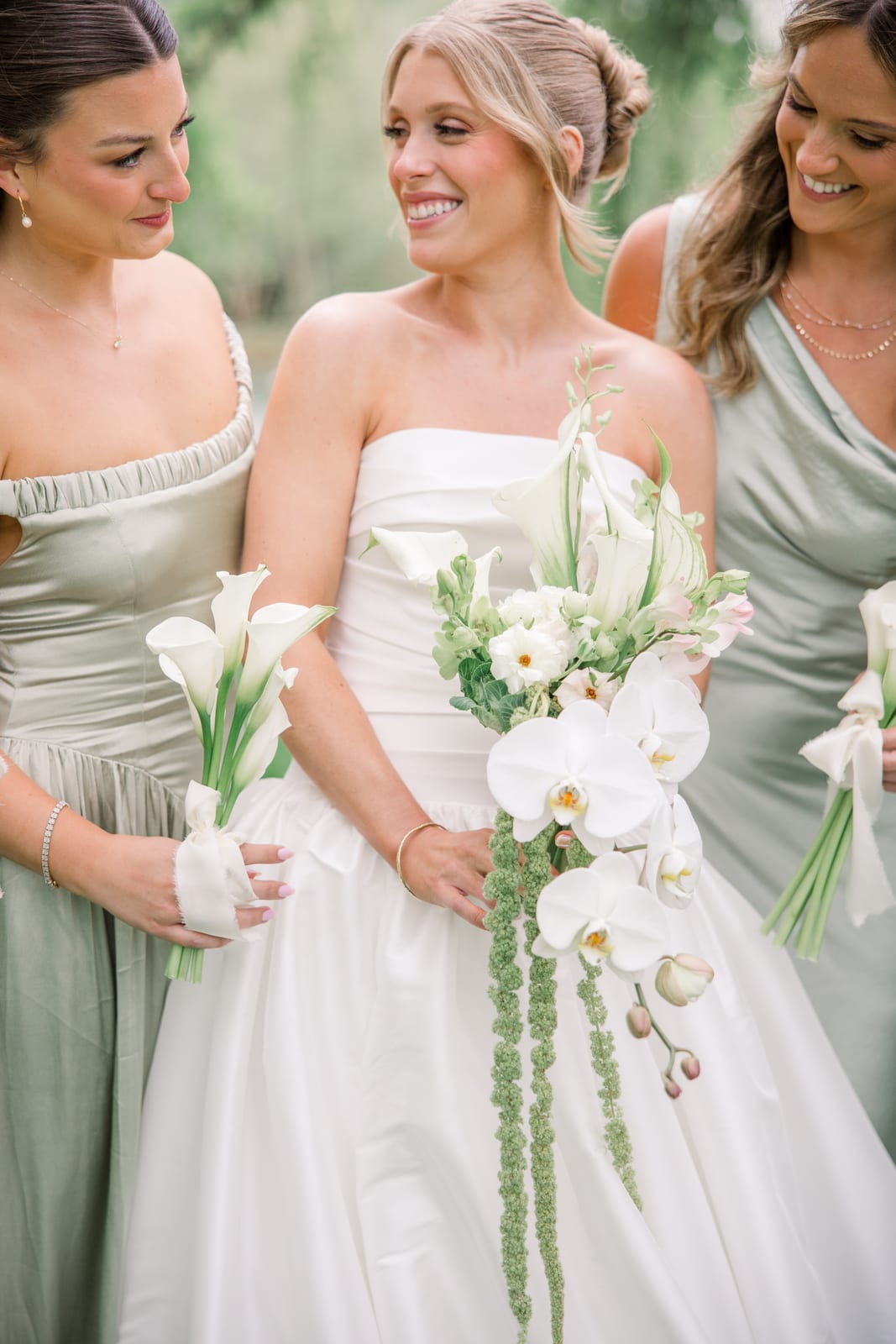 Bride and bridesmaids with orchid and calla bouquets at the Gabby & Matt wedding — designed by Lael Florals