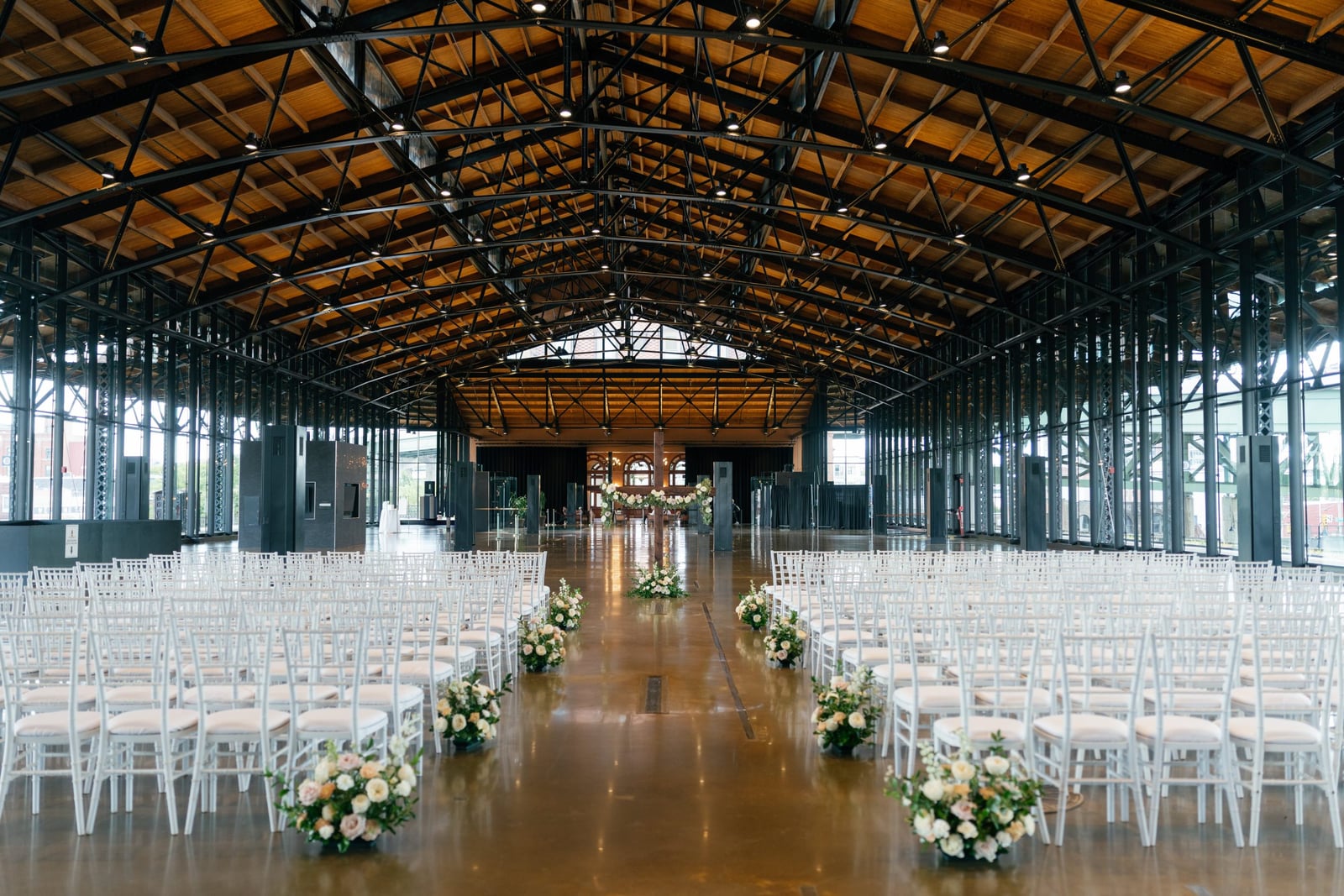 Cascading garden florals at an indoor wedding venue